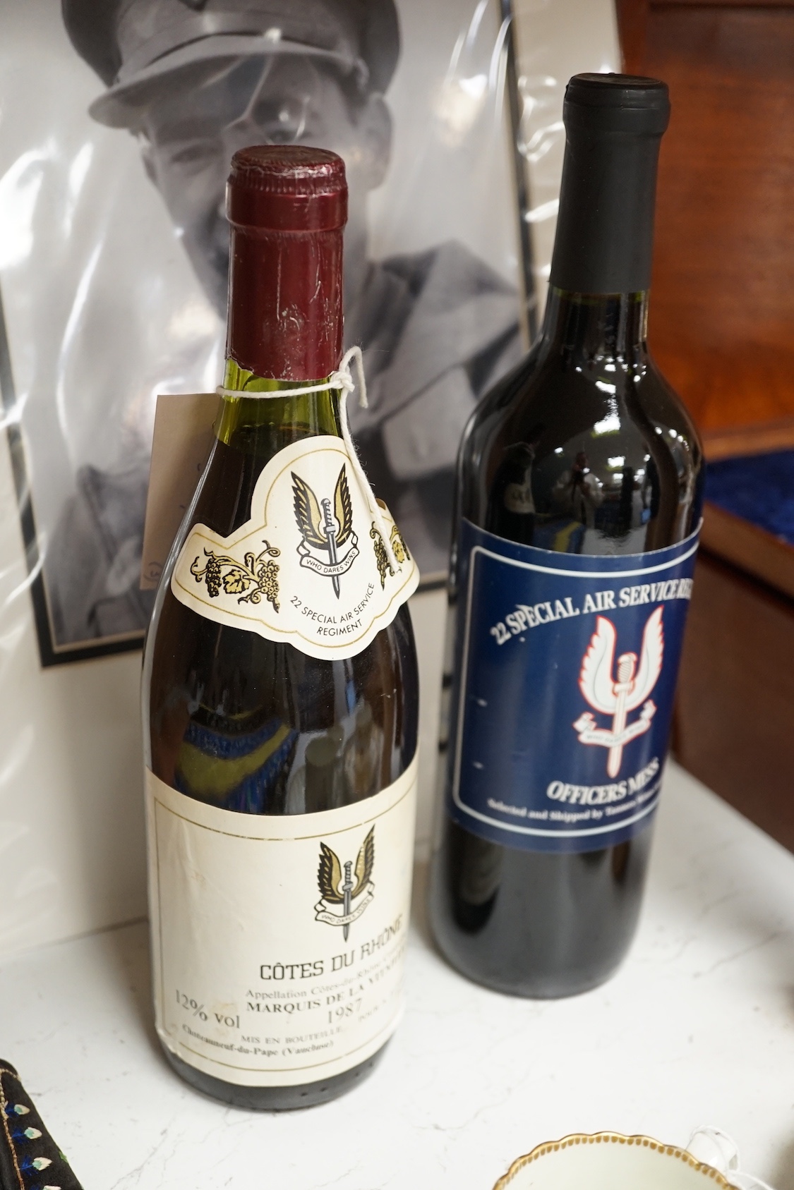 A mounted autograph: David Stirling (founder of the SAS) and two related bottles of wine